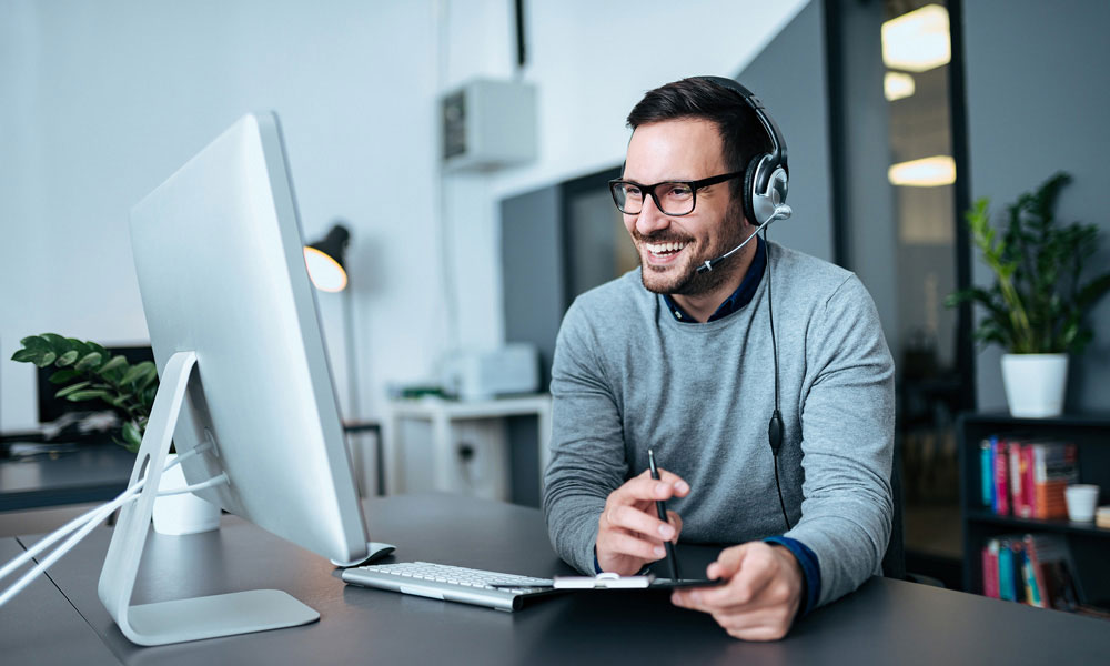 Man working at customer support online